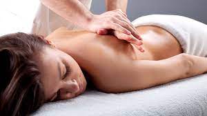 Couples get massage from man therapist